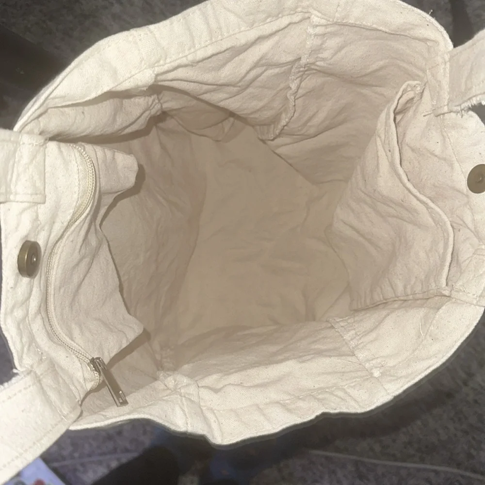 Public Goods Canvas Tote bag. Has 2 inner pockets one zippered, & bottle pocket. - Picture 3 of 4